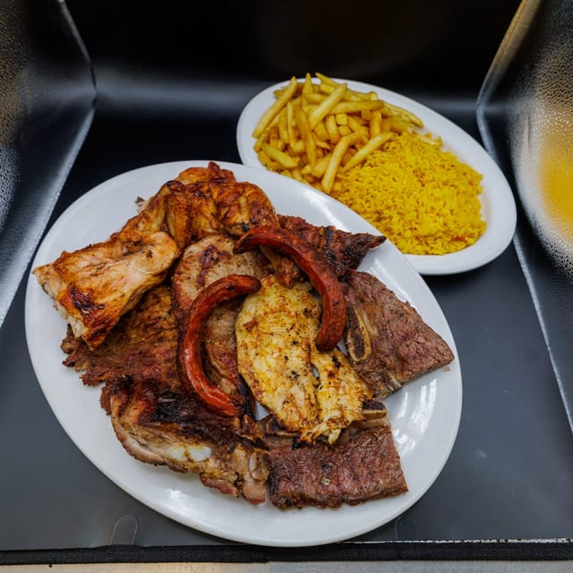 Parrillada Mixta (Served with rice and fries).