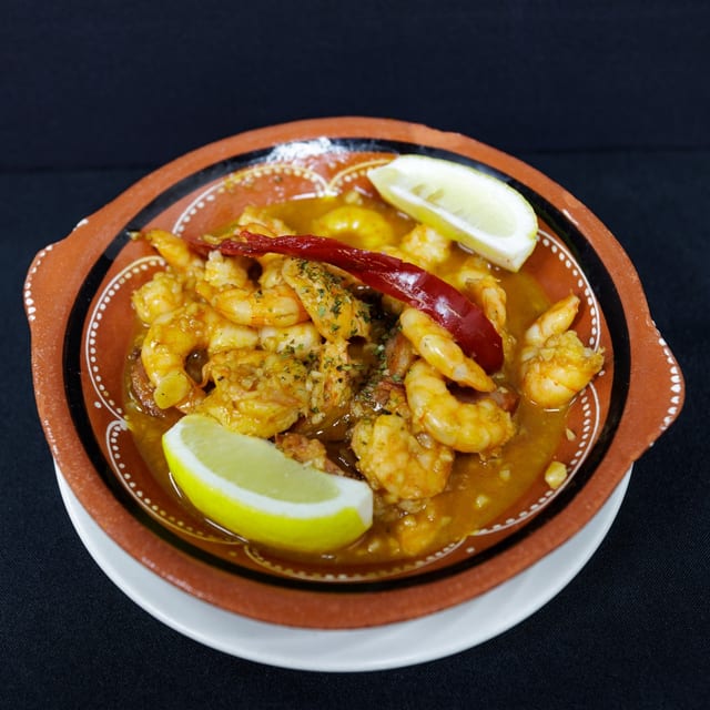 Shrimp and Sausage in Garlic Sauce.